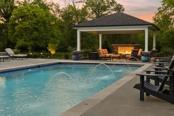 Luxury Outdoor Living Space With Pool and Outdoor Covered Structure in Zionsville