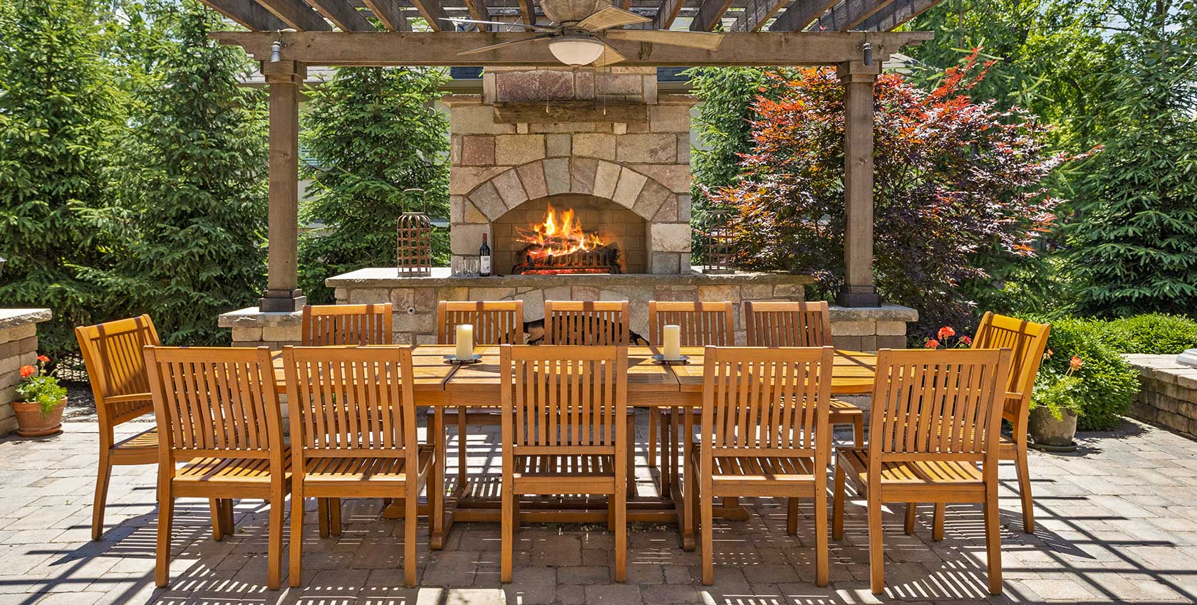 Outdoor kitchen area with fireplace.