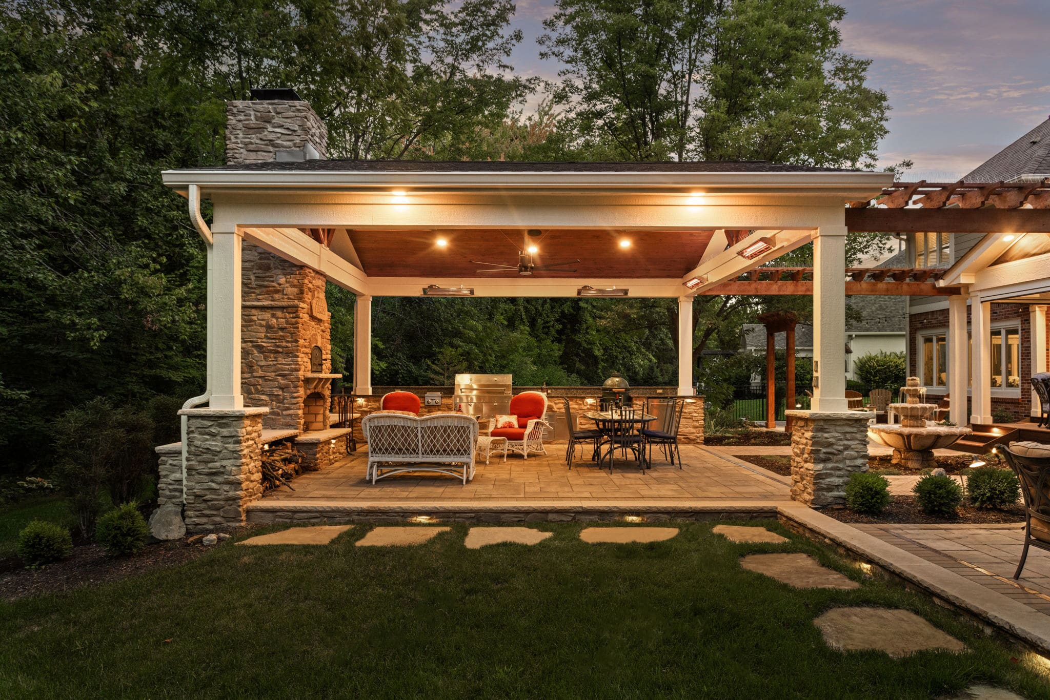 Landscape Design Featuring Fire Feature, Pavers, and Covered Outdoor Structure in Carmel Indiana