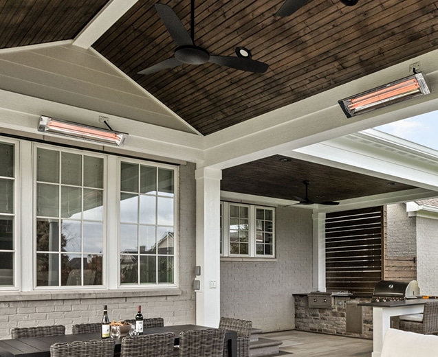 outdoor living space with heaters