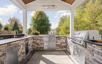 Incorporating Outdoor Kitchens and Bars into Patio Extensions for Elevated Entertaining